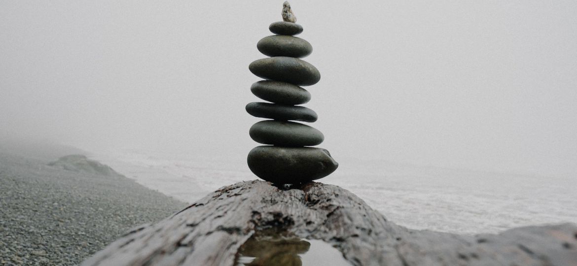 business and spirituality stones in balance